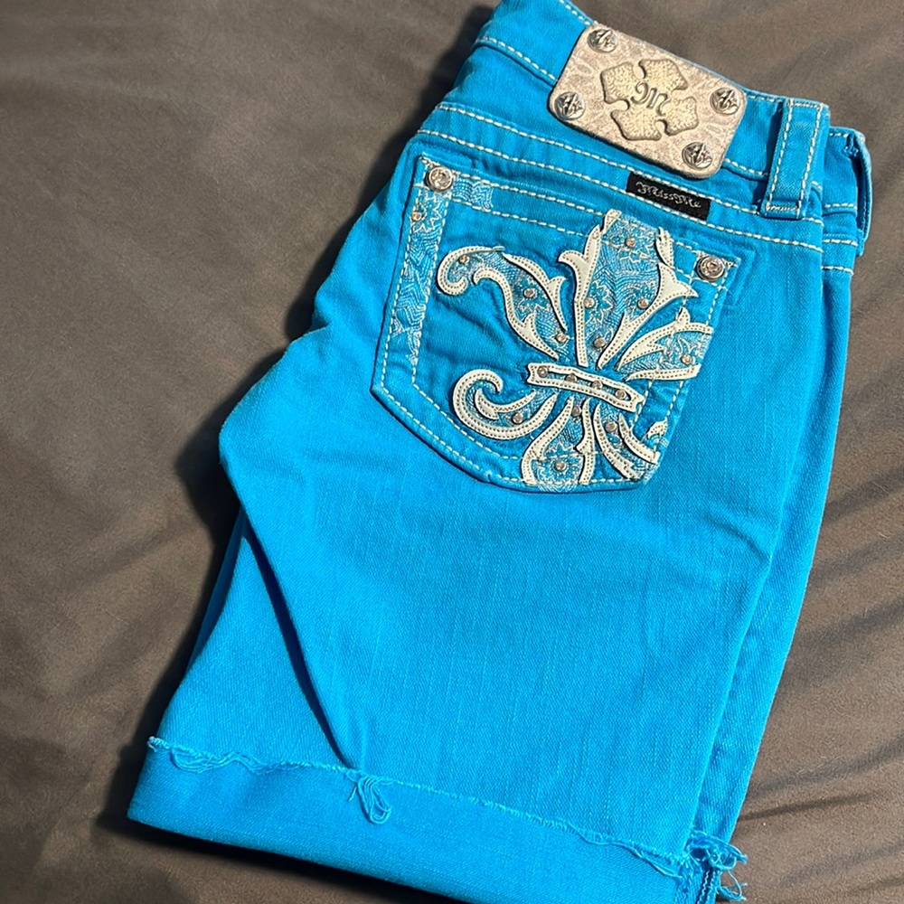 Miss Me capris that have been cut off into shorts.